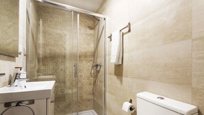 Apartment, 1 Bedroom | Bathroom | Shower, free toiletries, hair dryer, towels