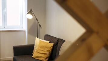 Apartment, 1 Bedroom | Living area | Flat-screen TV