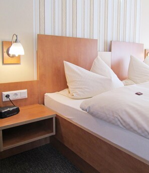 Caja de seguridad en la habitación, cortinas blackout y wifi gratis 