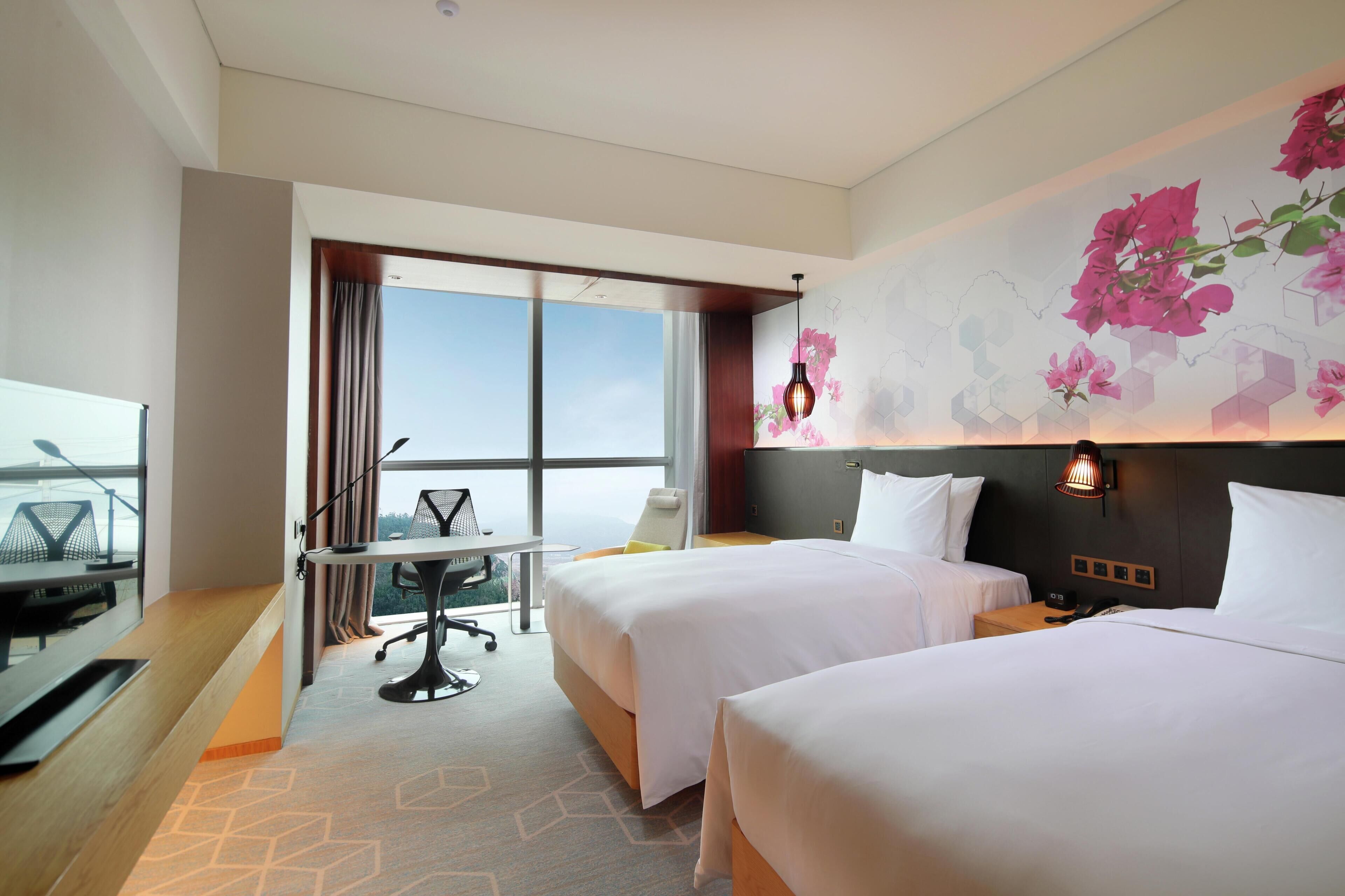 Twin Guest Room with View | Minibar, in-room safe, desk, laptop workspace