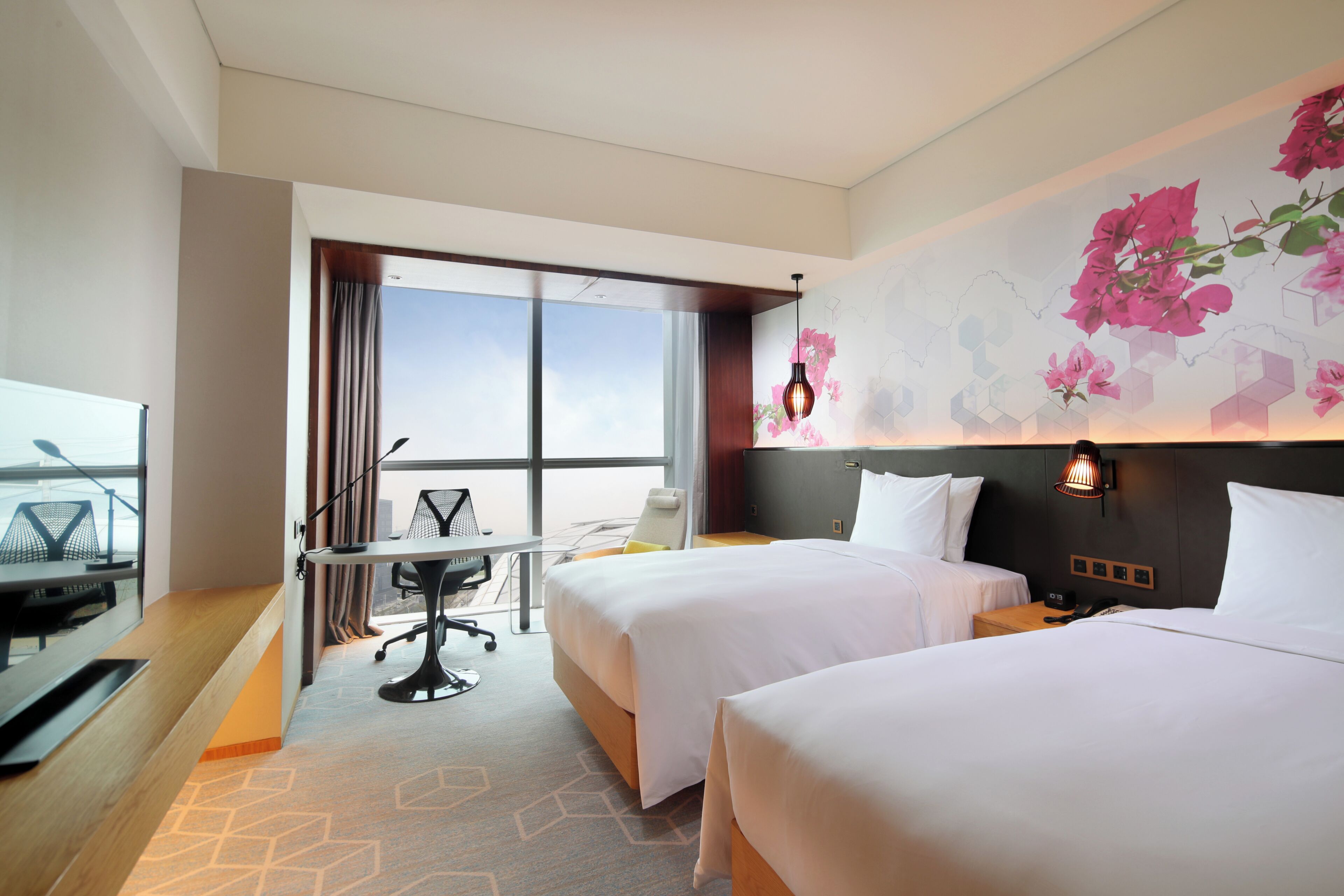 Twin Guest Room with View | Minibar, in-room safe, desk, laptop workspace