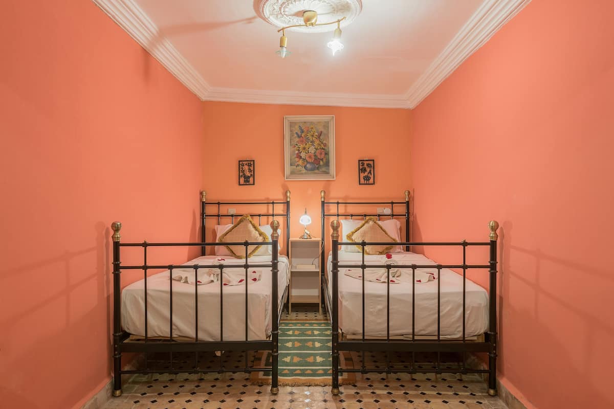 Twin Room, 2 Twin Beds | In-room safe, individually decorated, blackout drapes, soundproofing