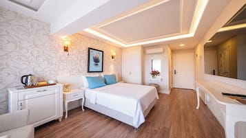 Egyptian cotton sheets, premium bedding, down comforters, minibar