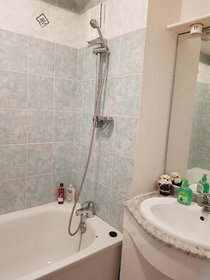 Combined shower/tub, hair dryer