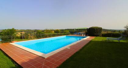 Typical Valdichiana farmhouse in red bricks, near the border between Tuscany and Umbria and a few km