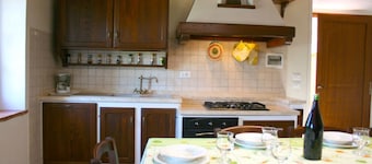 Old stone farmhouse, large outdoor area with paved terrace equipped with garden furniture. Quiet and