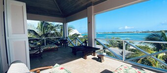 The Penthouse overlooking Cocoa  bay,steps to the beach , with starlink internet