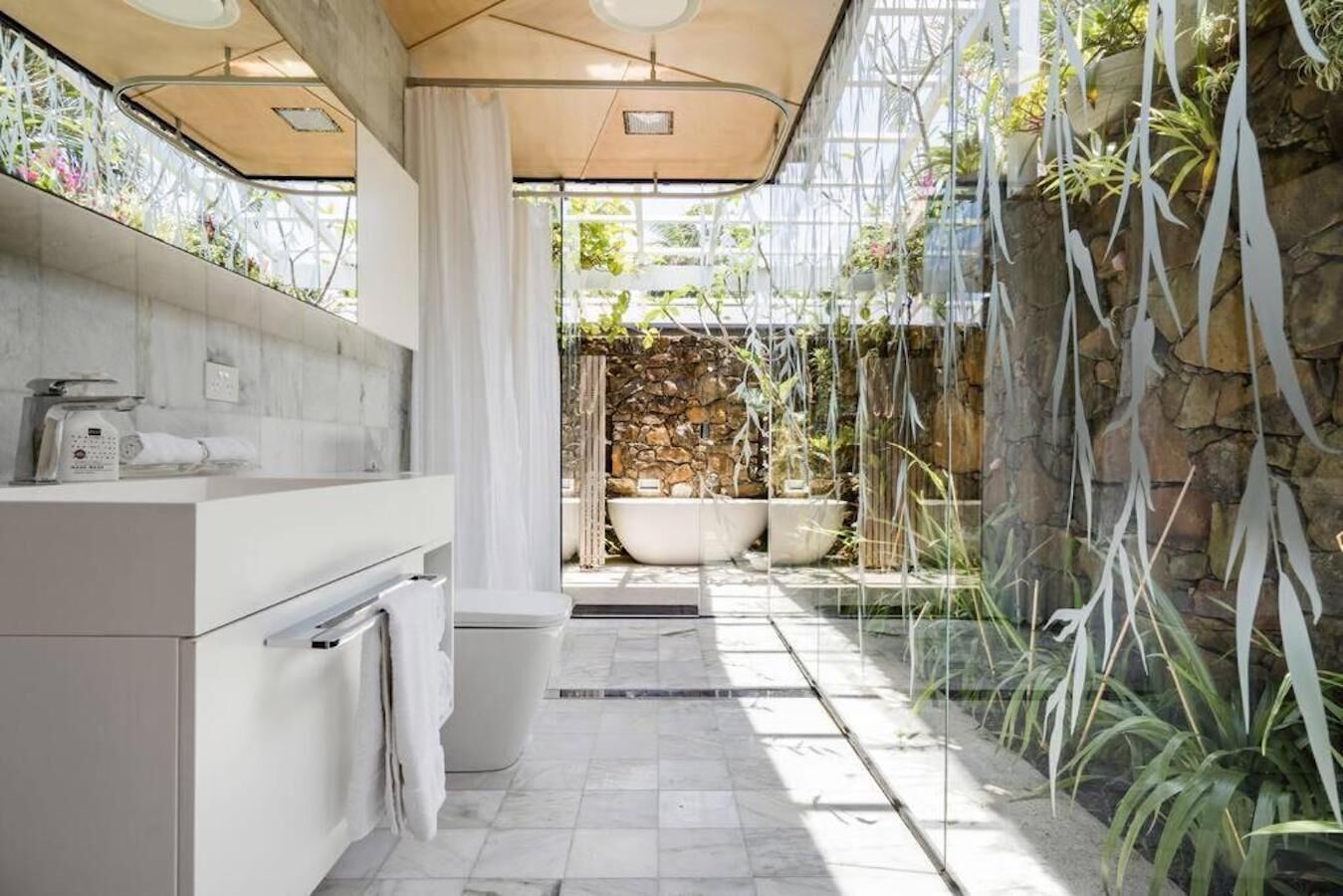 Bathtub, hair dryer, towels, soap
