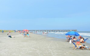 On the beach, sun-loungers, beach towels