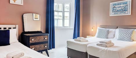 4 bedrooms, iron/ironing board, travel cot, WiFi