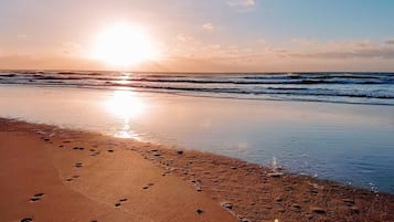 Beach nearby, sun loungers