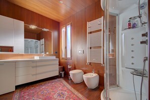 Hair dryer, bidet, towels, soap