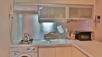 Family House | Private kitchen | Full-size fridge, microwave, stovetop, electric kettle