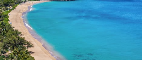 On the beach, sun-loungers, beach towels