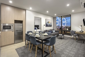 Two Bedroom Executive Apartment | Living area | LCD TV, Netflix, iPod dock, streaming services