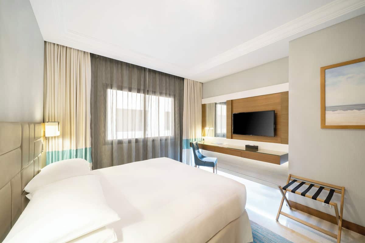 Premium Suite, 2 Bedrooms, Smoking | 1 bedroom, pillowtop beds, in-room safe, desk