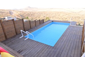 Outdoor pool, pool umbrellas, pool loungers