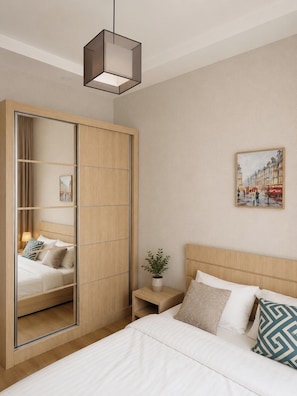 A modern bedroom with a bed, a nightstand, a mirror, and a painting on the wall. - Vazi Aparthotel (Tbilisi)