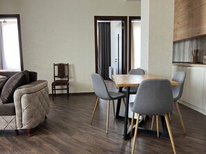 Luxury Apartment | Living area | Flat-screen TV - Vazi Aparthotel (Tbilisi)