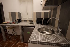 Appartement, 1 chambre (Fori up) | Coin cuisine privé | Grand réfrigérateur, micro-ondes (sur demande), plaque de cuisson