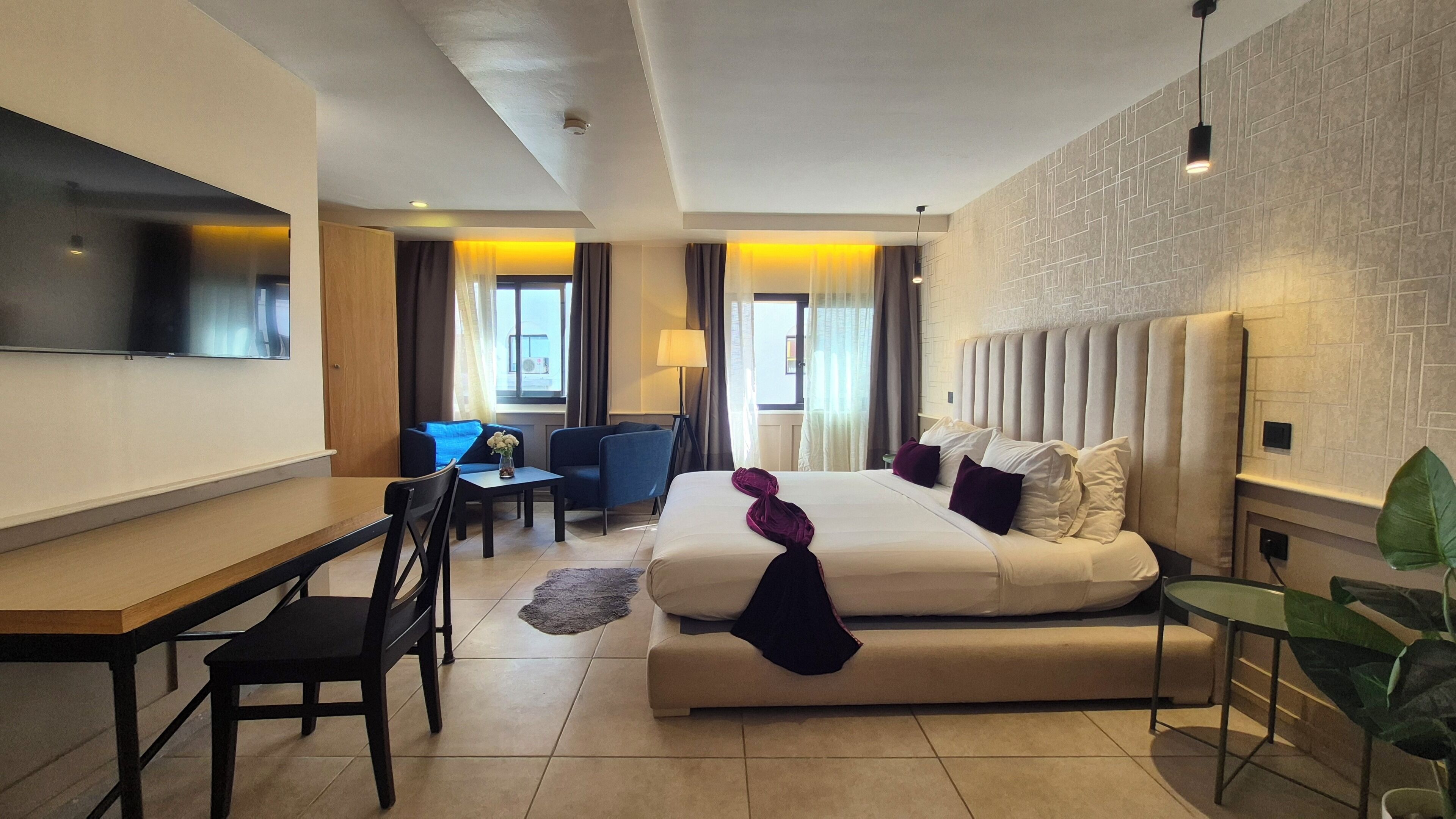 Deluxe Room, City View | Premium bedding, minibar, in-room safe, desk