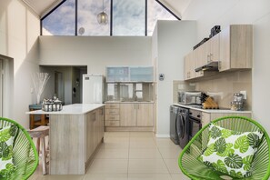Family Apartment, 2 Bedrooms, Partial Ocean View | Private kitchen | Fridge, microwave, oven, stovetop - Azure 213 On Big Bay (Cape Town)