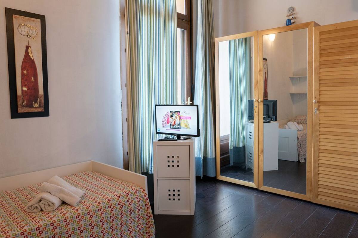 Desk, iron/ironing board, free WiFi, bed sheets