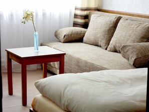 Singola Comfort | Area soggiorno | TV a schermo piatto