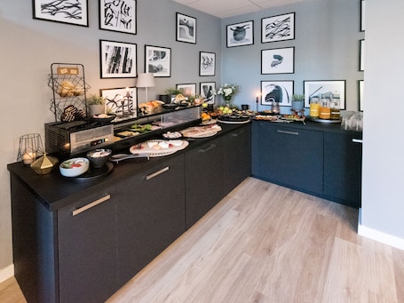 Daily buffet breakfast (EUR 19.9 per person). DORMERO Hotel Xanten