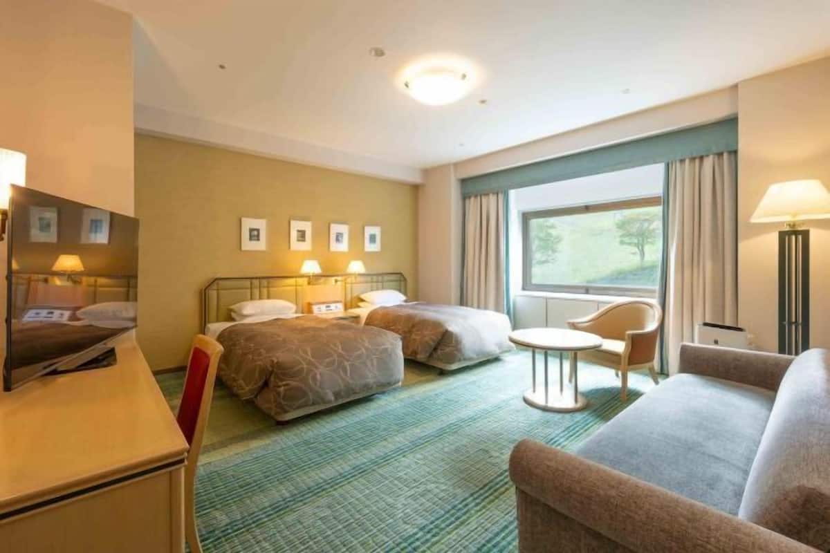 2 chambres, coffres-forts dans les chambres, bureau, Wi-Fi gratuit