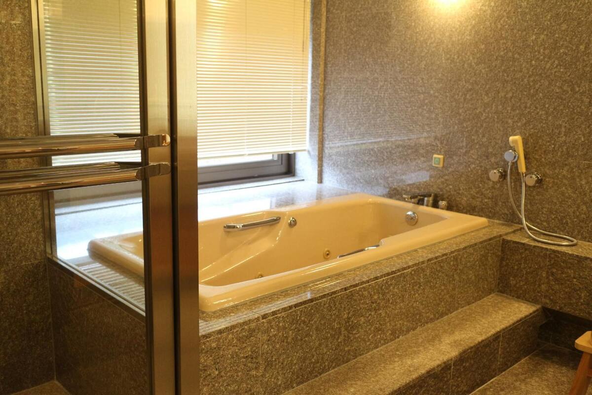 free toiletries, hair dryer, slippers, electronic bidet