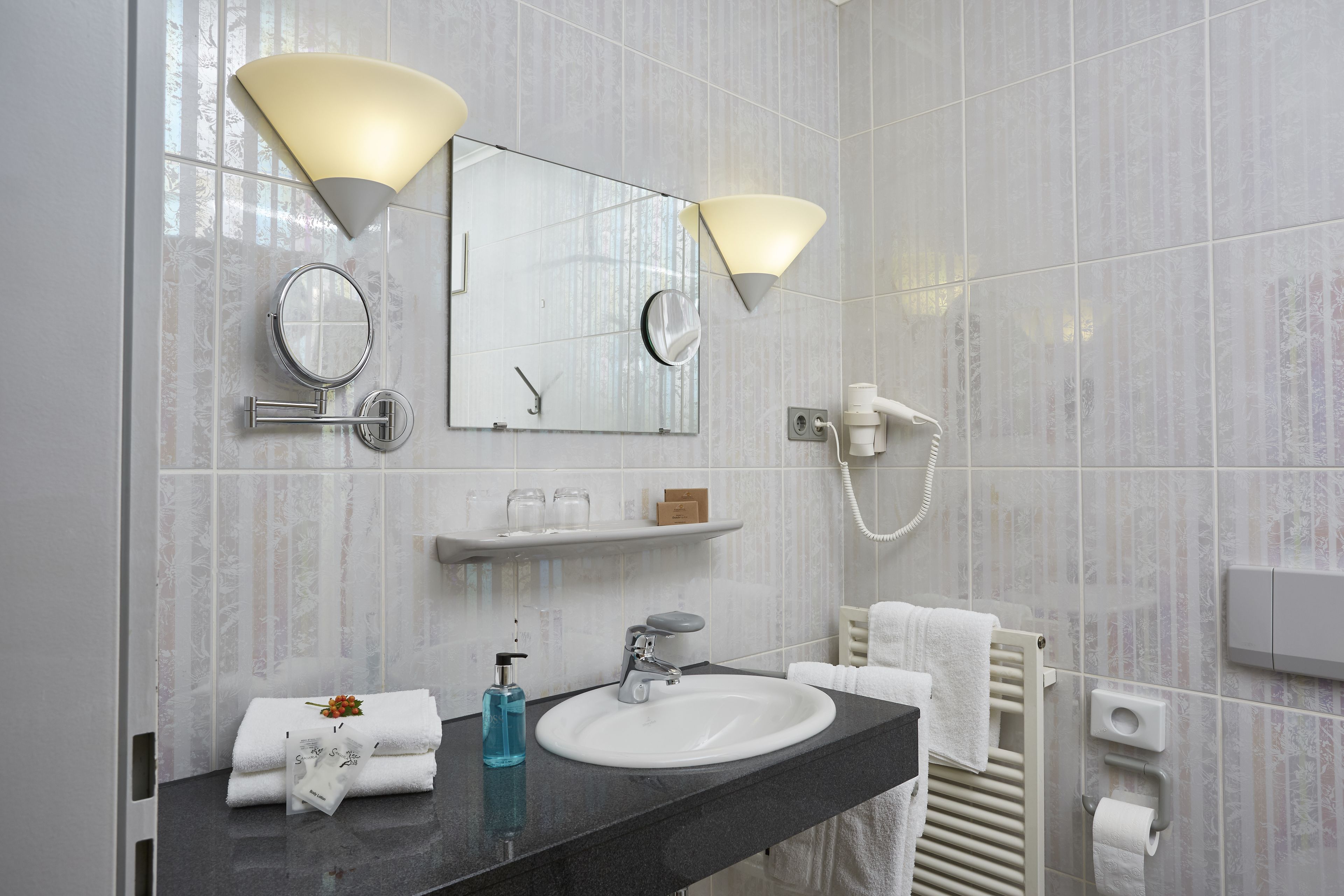 free toiletries, hair dryer, towels, soap