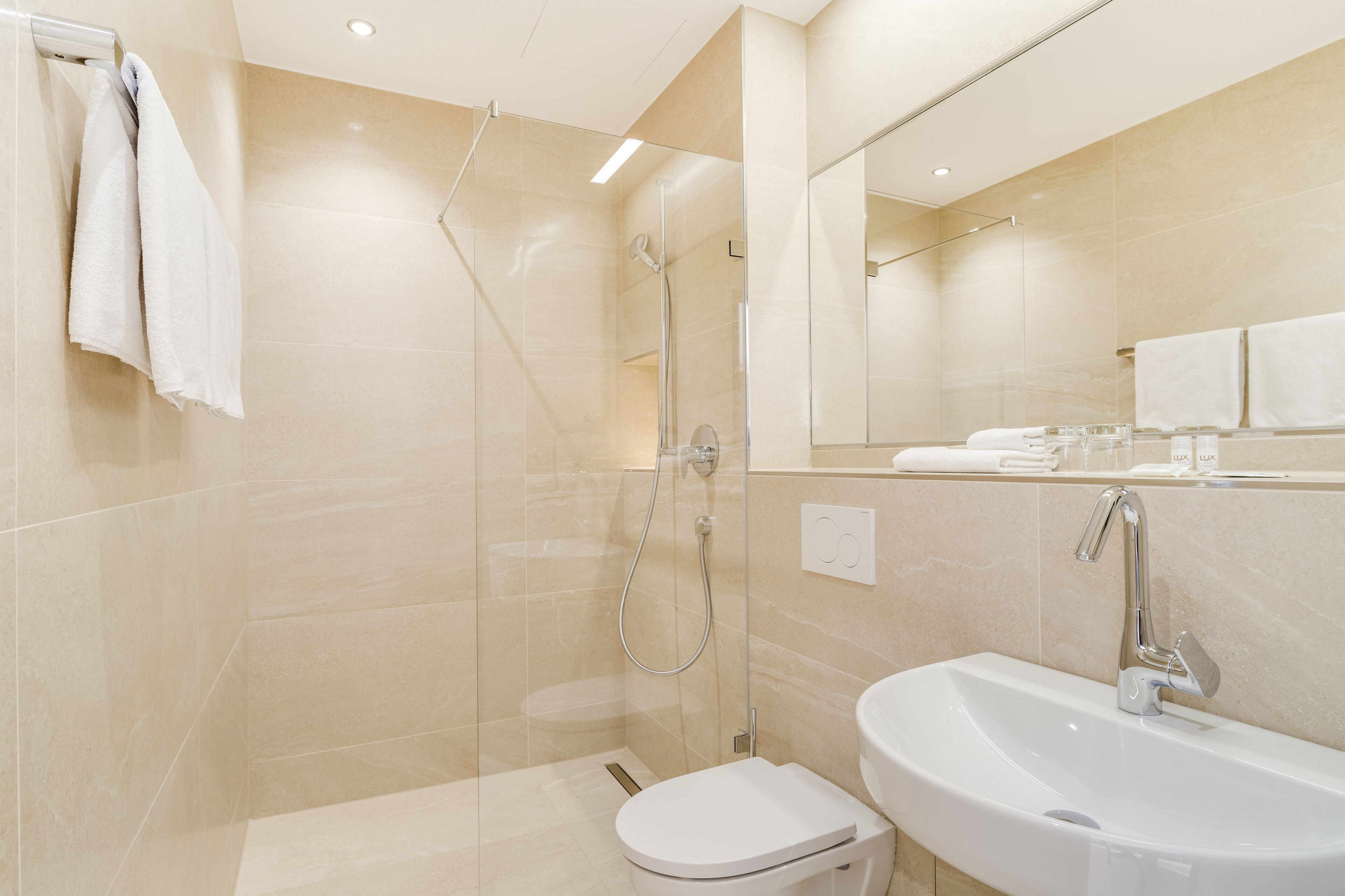 shower, free toiletries, hair dryer, towels