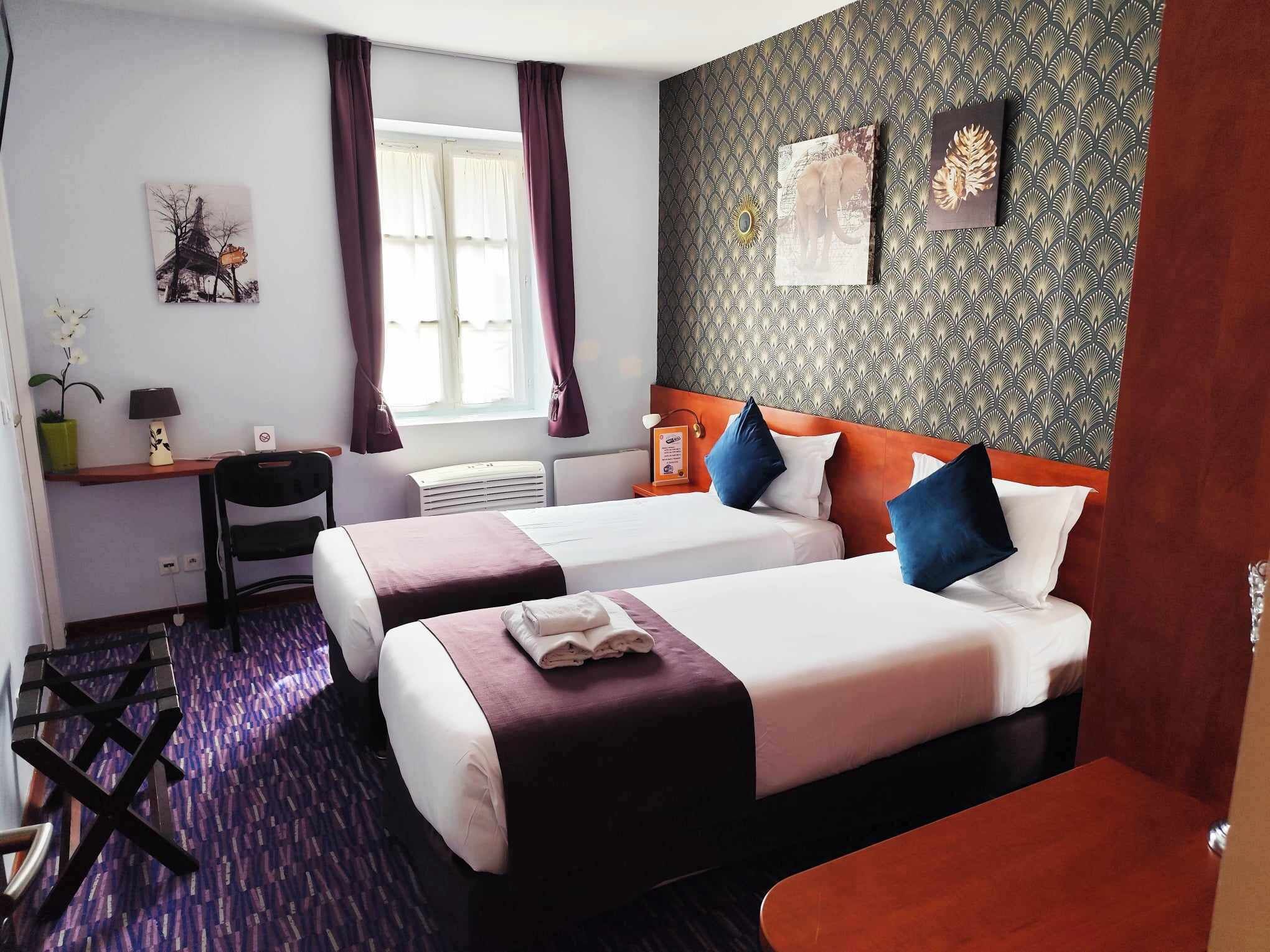 twin room | in-room safe, individually decorated, individually furnished, desk