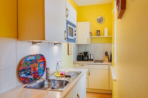 Fridge, microwave, highchair