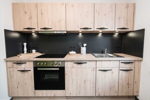 Fridge, oven, dishwasher, high chair