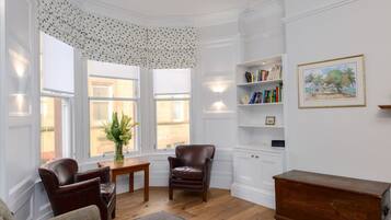 Apartment, Multiple Beds | Living area | TV, fireplace