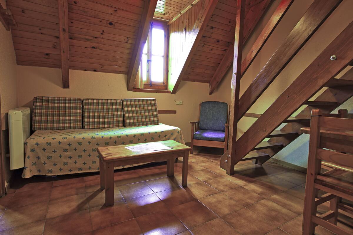 Desk, blackout curtains, free cots/infant beds, free WiFi