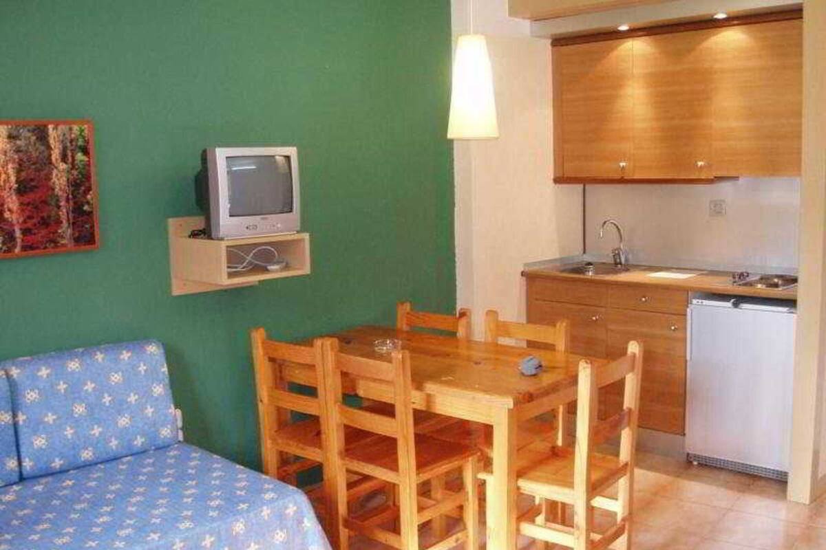 Desk, blackout curtains, free cots/infant beds, free WiFi