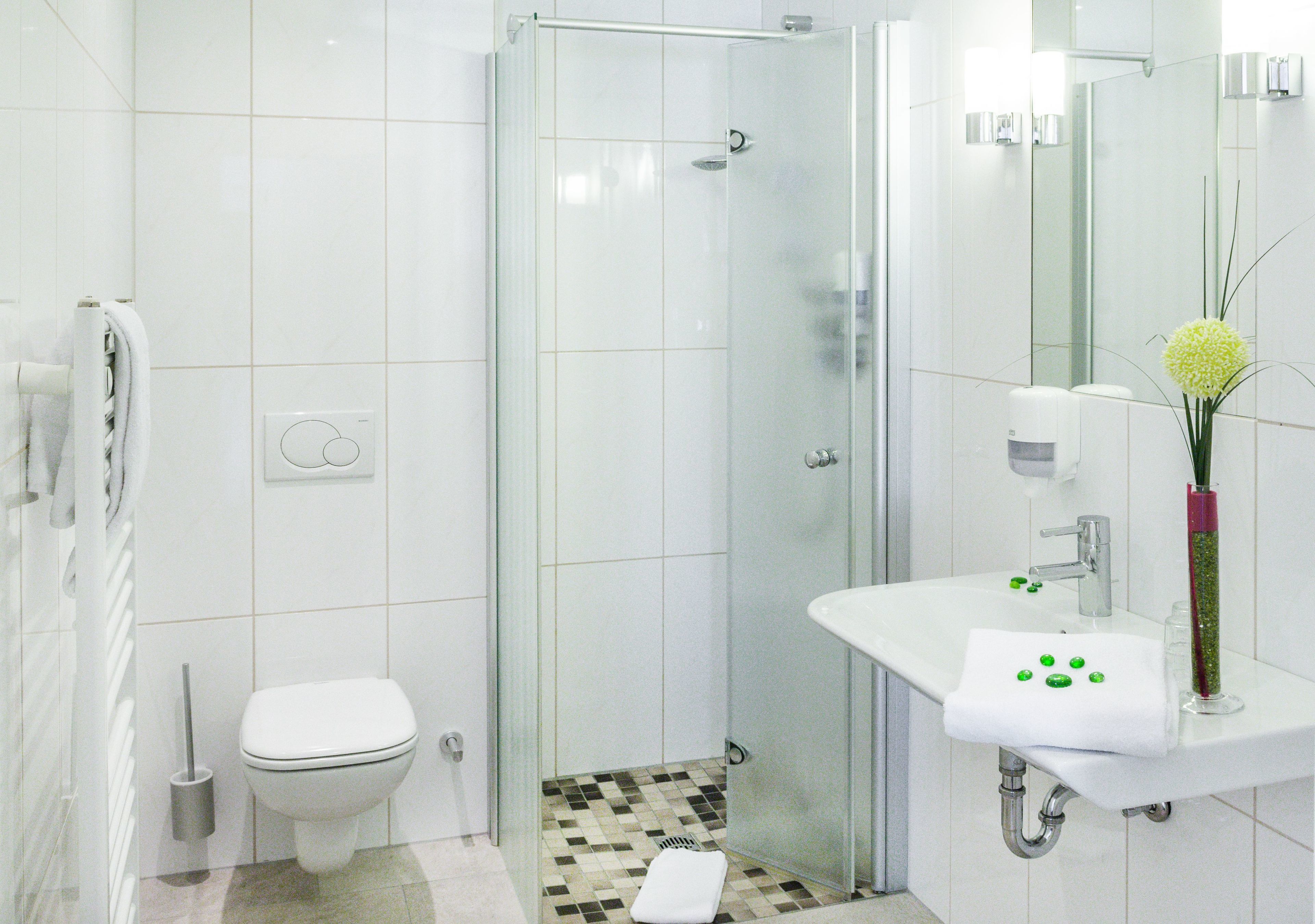 shower, free toiletries, hair dryer, towels