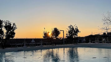 Seasonal outdoor pool, pool loungers