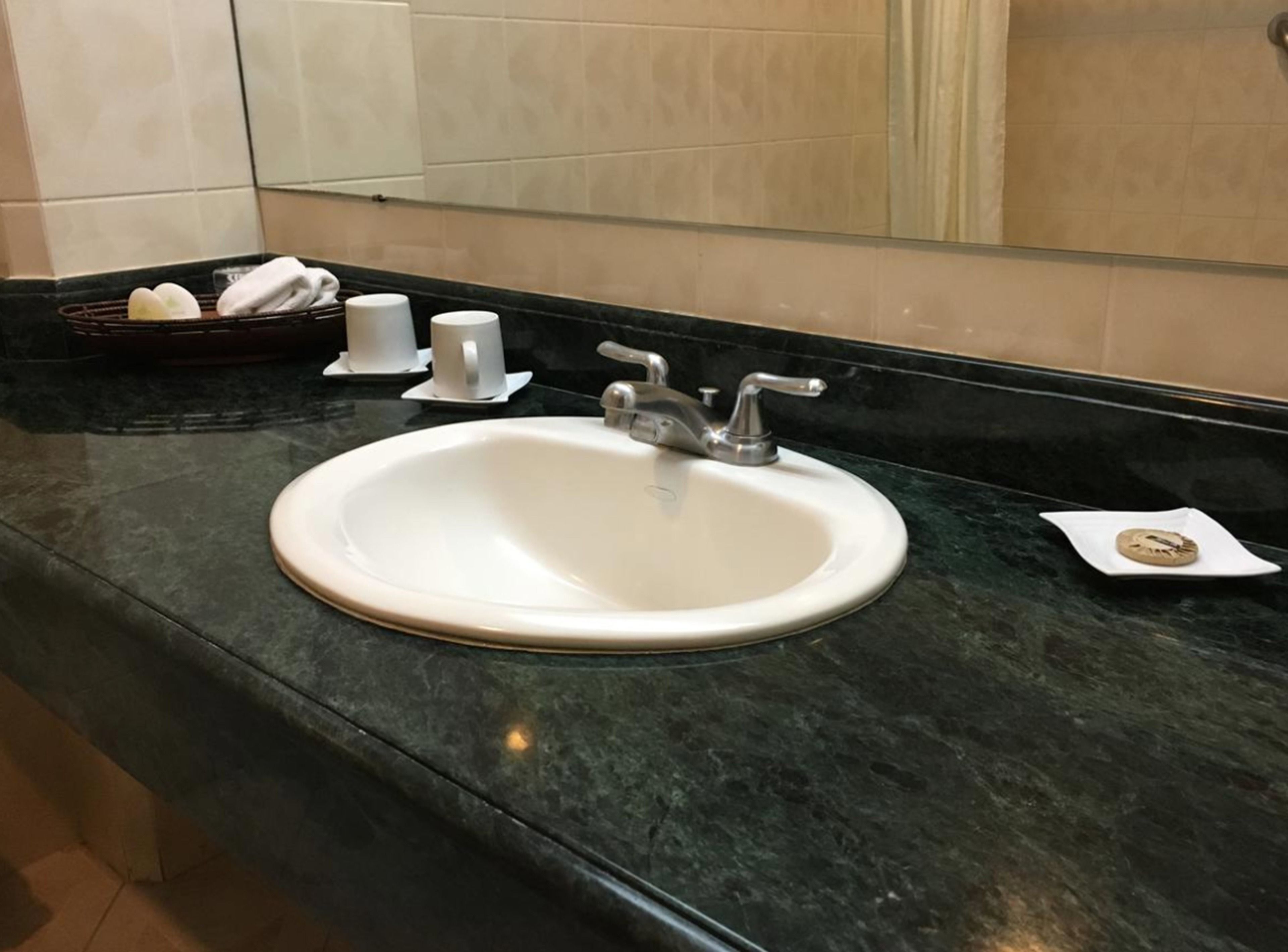 combined shower/bathtub, deep-soaking bathtub, free toiletries