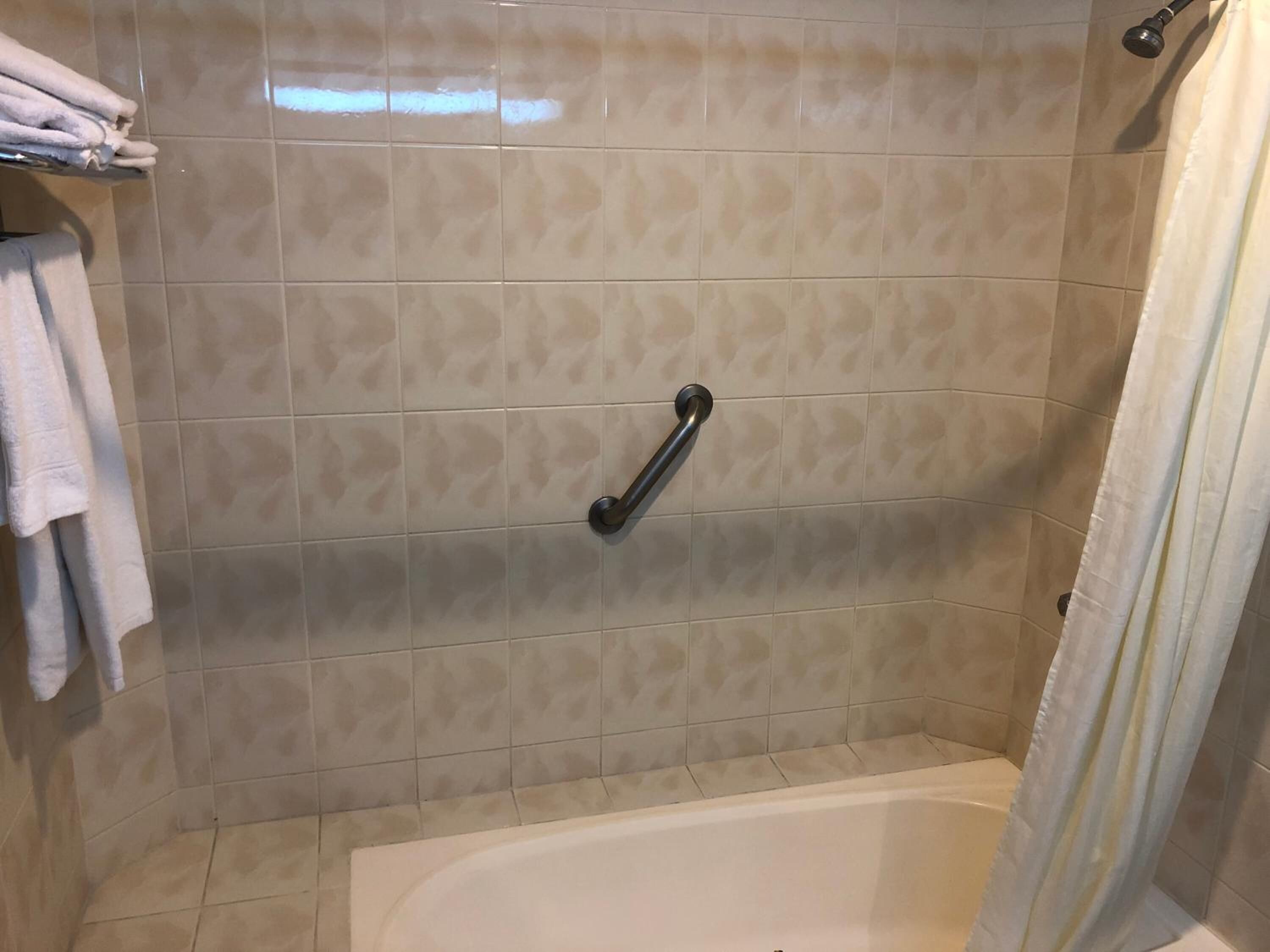 combined shower/bathtub, deep-soaking bathtub, free toiletries