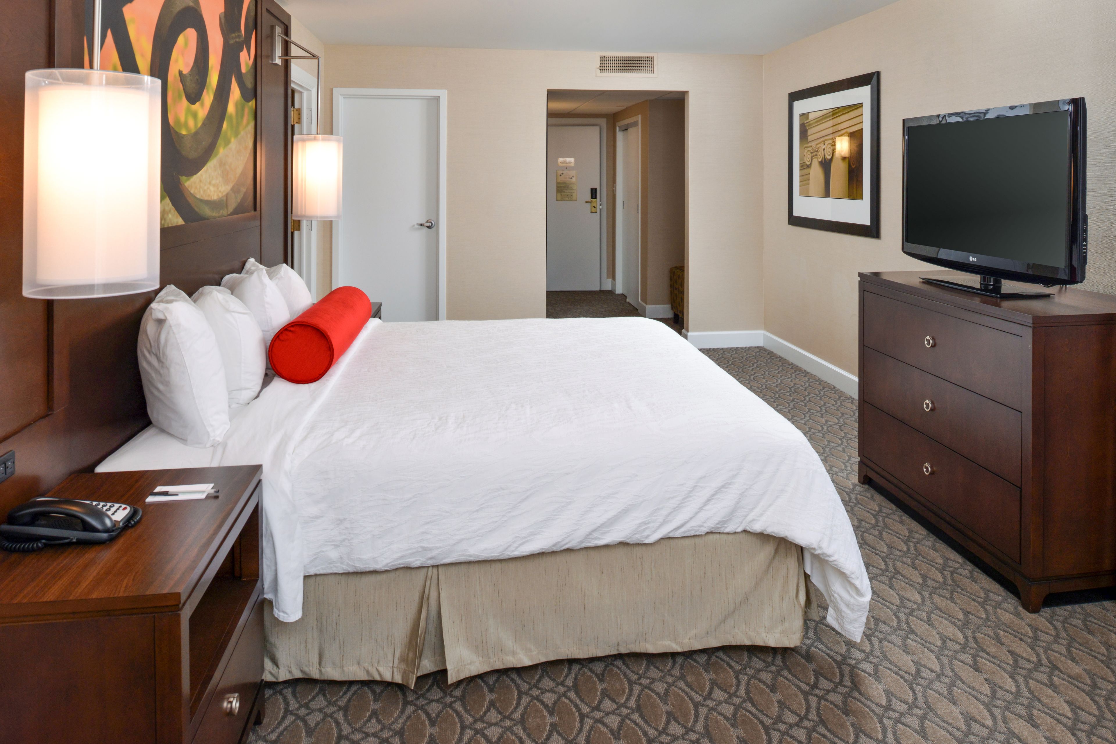 standard room, 1 king bed, refrigerator & microwave | in-room safe, desk, iron/ironing board, rollaway beds