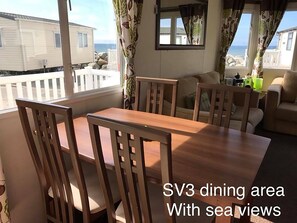 Seaview 3 Caravan  | Living area | Flat-screen TV - Seaview 3 (Talybont)
