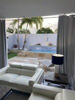 Luxury Double Room | Living area | 45-inch flat-screen TV with digital channels, TV