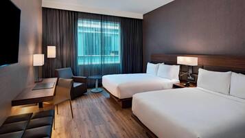 Room, 2 Double Beds | Desk, iron/ironing board, free cribs/infant beds, free WiFi