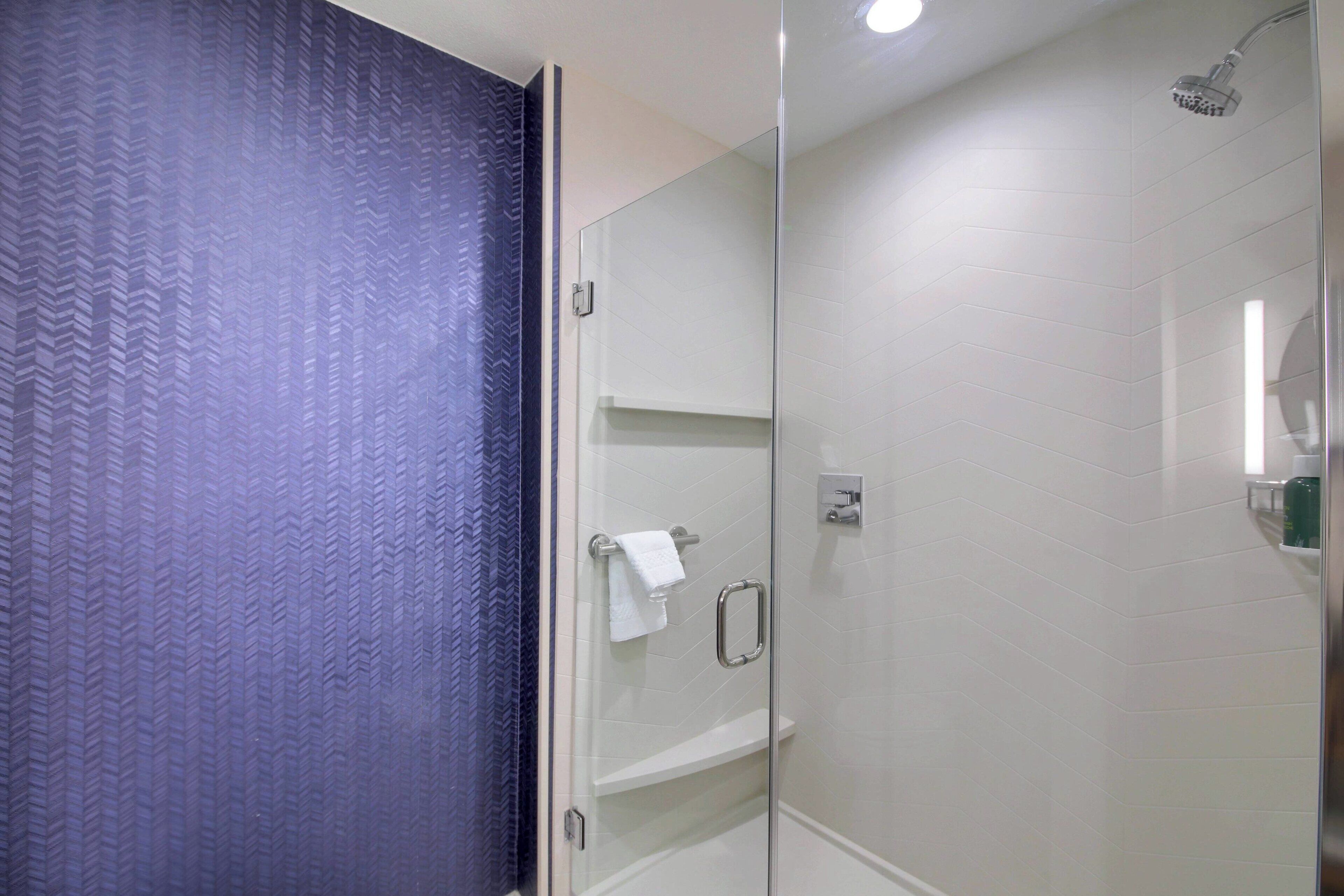 combined shower/bathtub, free toiletries, hair dryer, towels