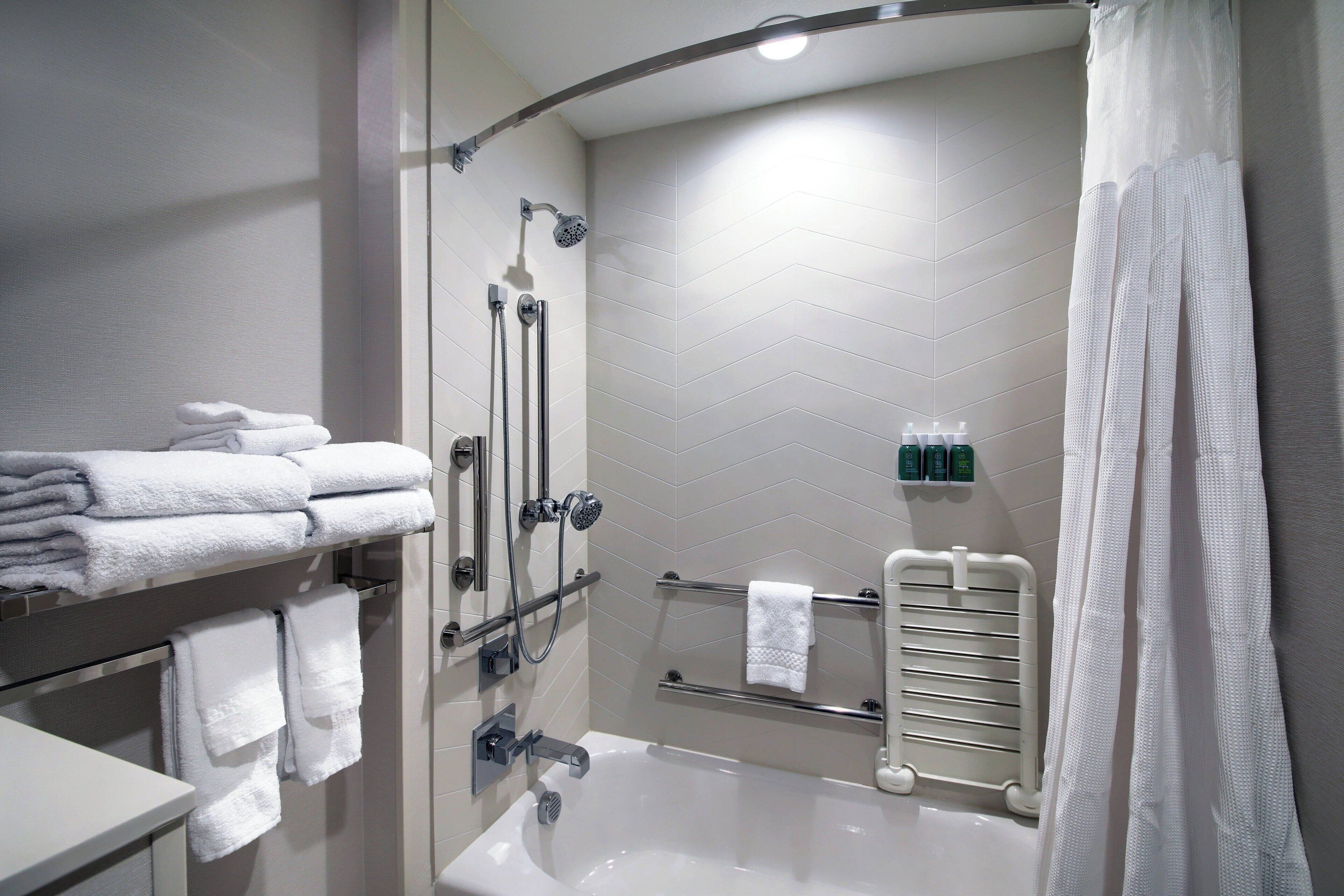 combined shower/bathtub, free toiletries, hair dryer, towels