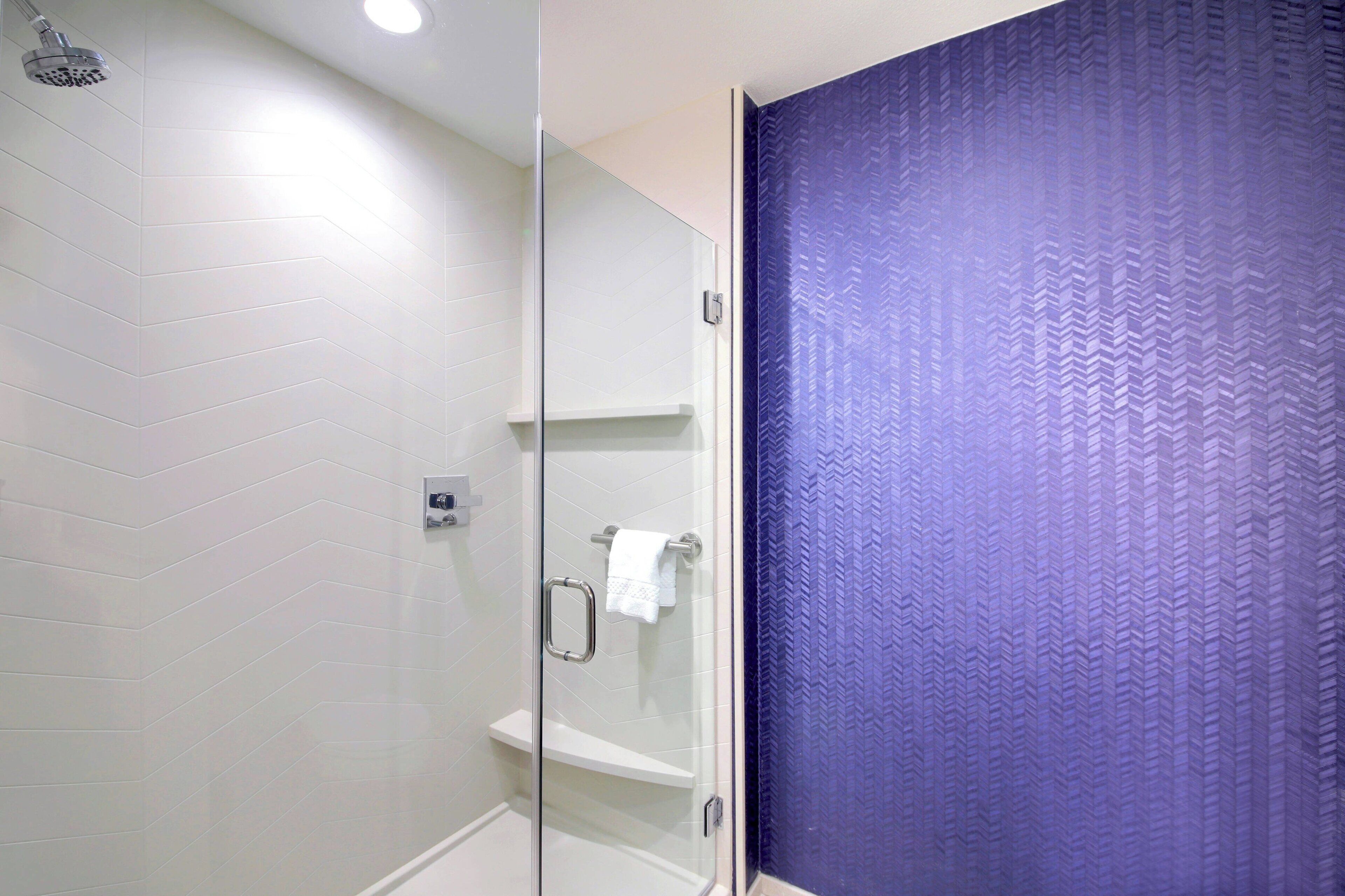 combined shower/bathtub, free toiletries, hair dryer, towels